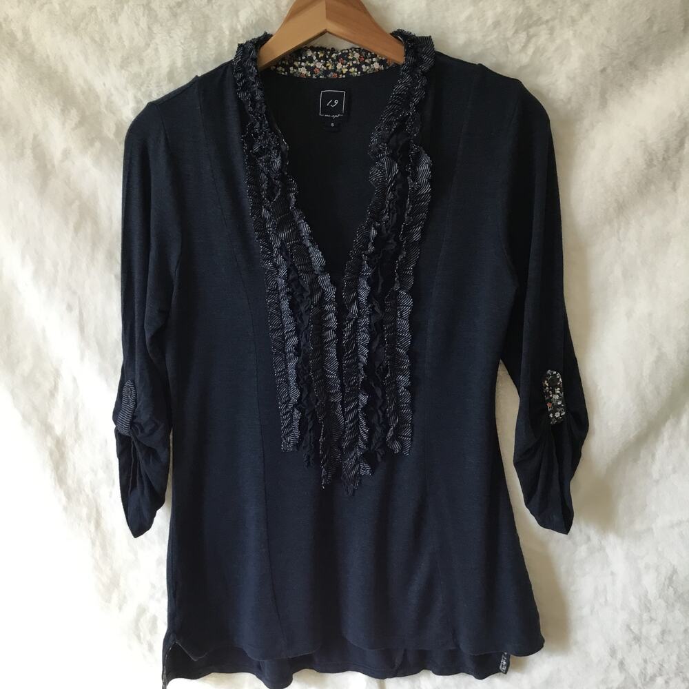 Chic Navy Blue V-Neck Top with Ruffle Detail